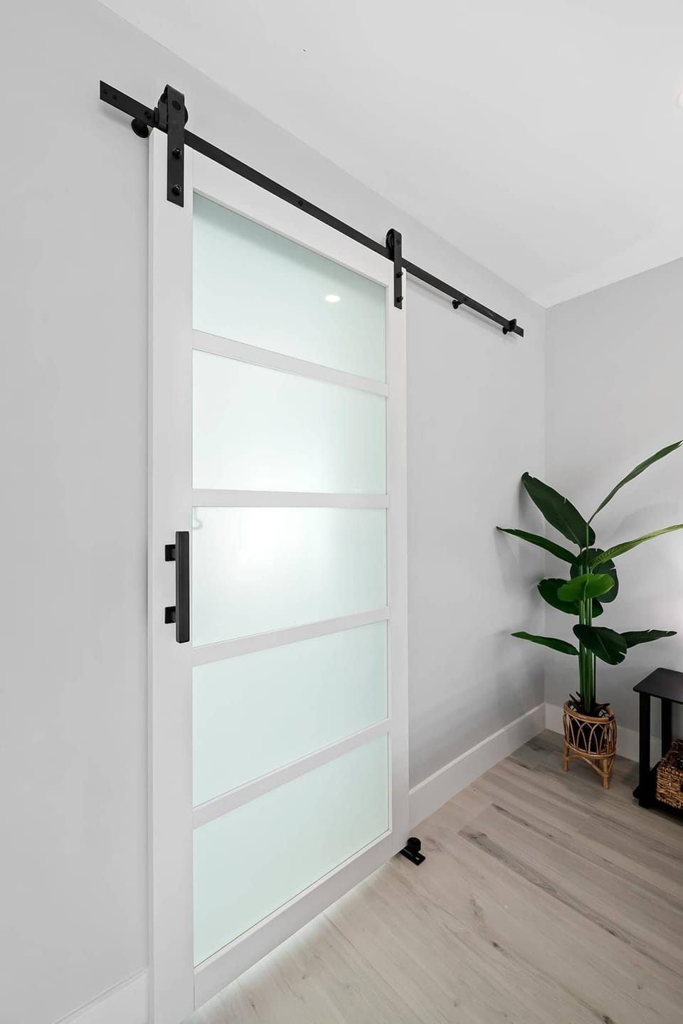 Barn door entrance to master bathroom 