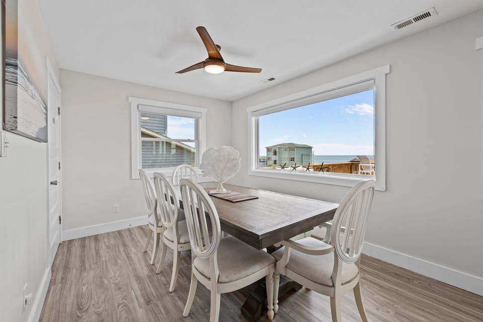 Dine with a View - Cozy Coastal Dining space with Natural light