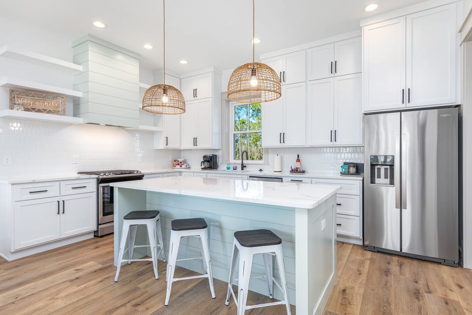 Gourmet kitchen - gas stove and open layout. Large island, great for socializing