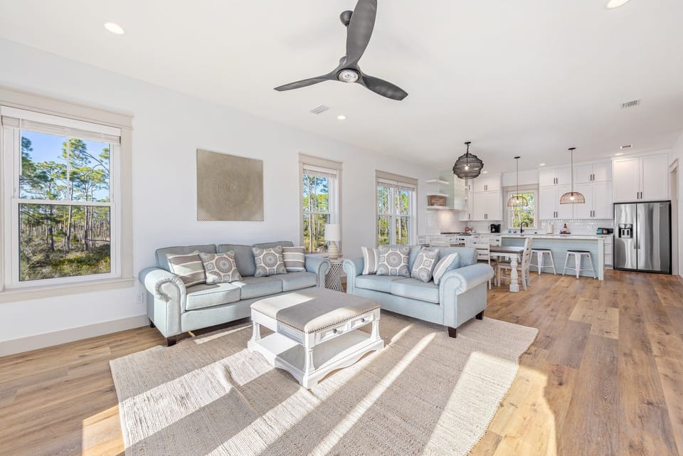 Tall ceilings, open layout invite you into this custom home for dream vacation!