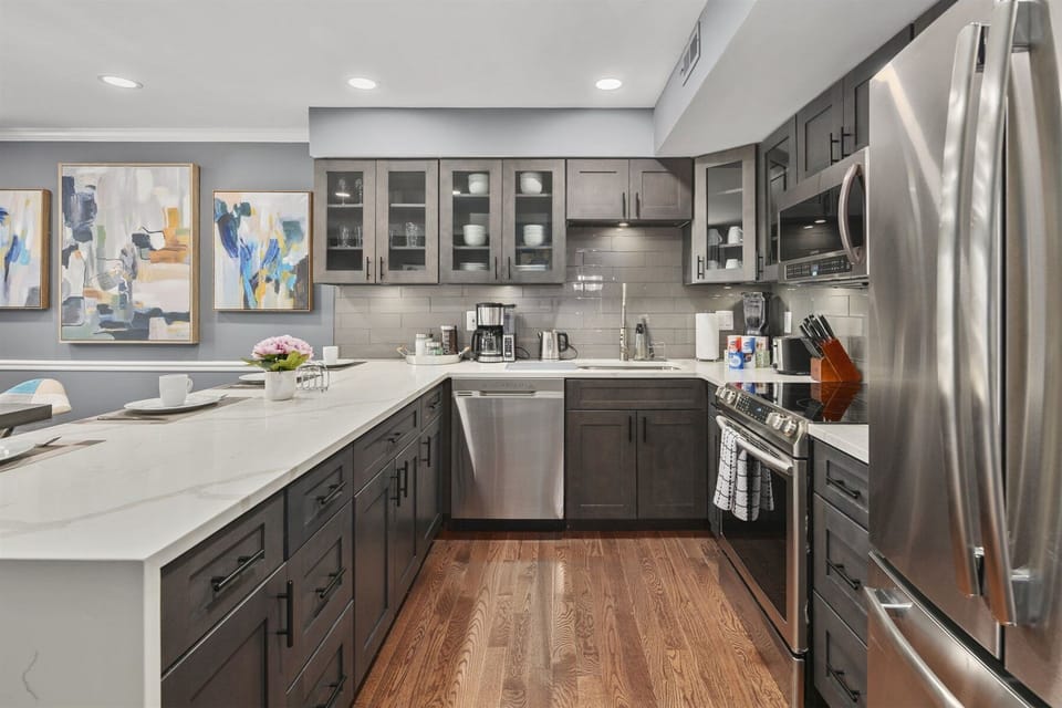 Luxurious kitchen styled with a marble countertop