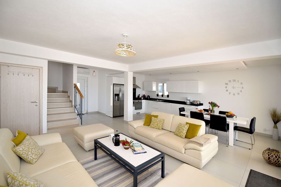 Comfortable sofas and satellite TV for your relaxation