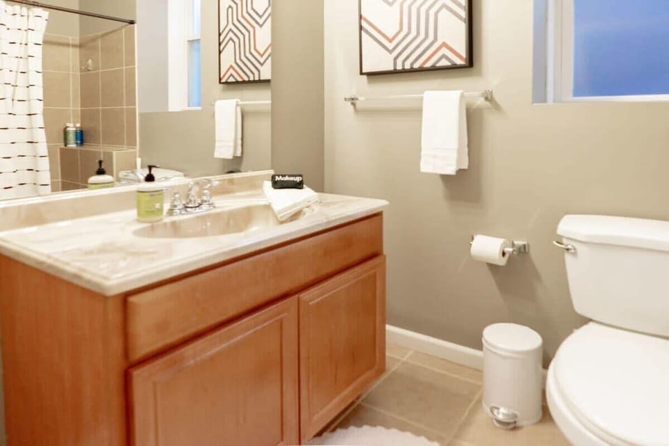The first full bathroom is stocked with all amenities