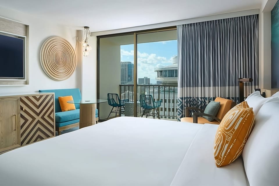 Wake up to skyline views and unwind on your balcony.