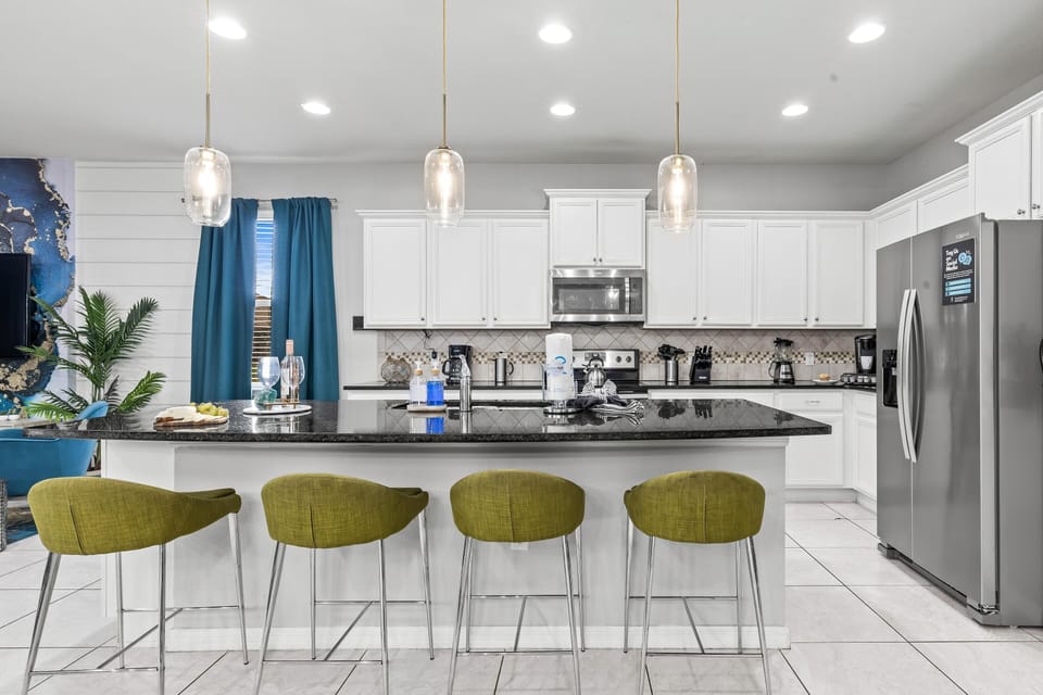Well stocked kitchen and seating for huge family meals!