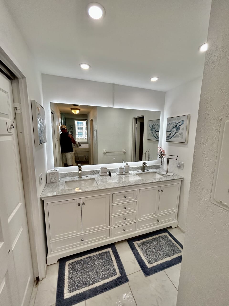 Newly rennovated dual sink bathroom with steam free mirror