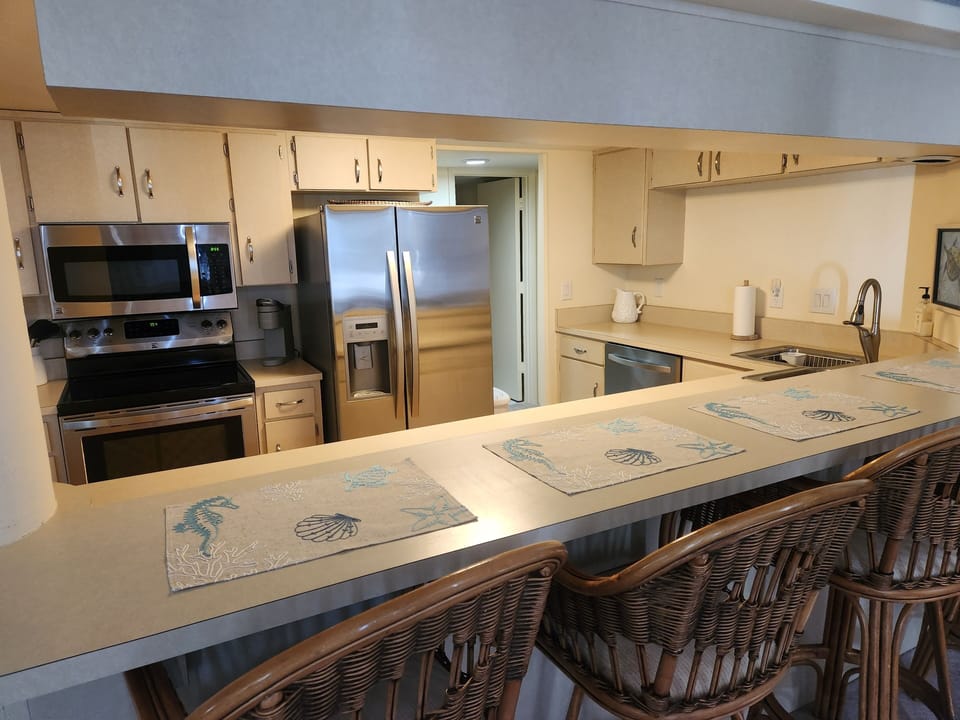 Fully equipped, well-organized kitchen! Storage closet/pantry provides space!