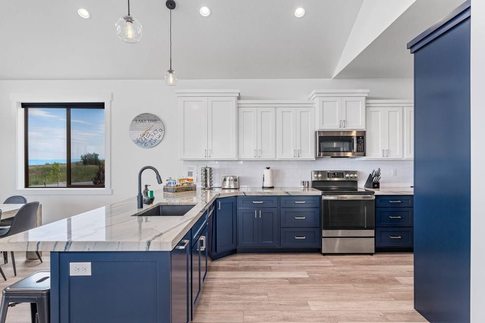 Serve up your entire crew.  Enjoy a fully stocked kitchen with most appliances, utensils, serveware and a stocked coffee bar with a Kuerig and a selection of coffee, tea, hot chocolate and creamer.