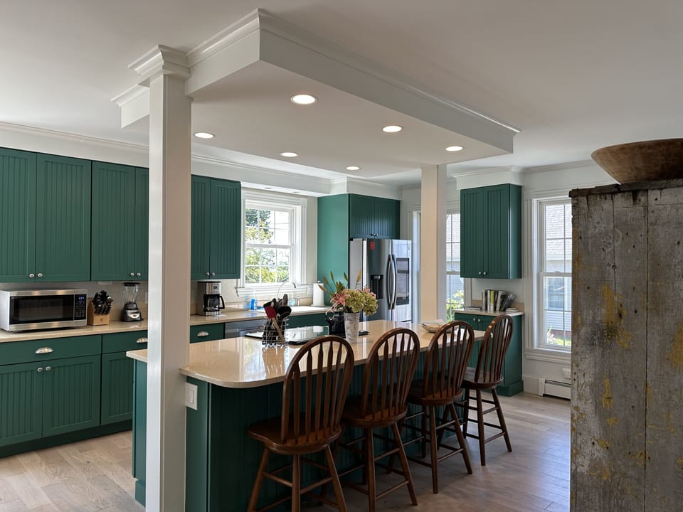 Entering the home, into the fully equipped kitchen-