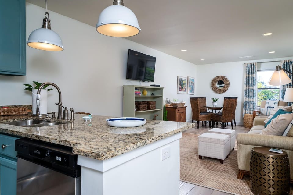 An inviting open concept combines the living, dining and kitchen areas.
