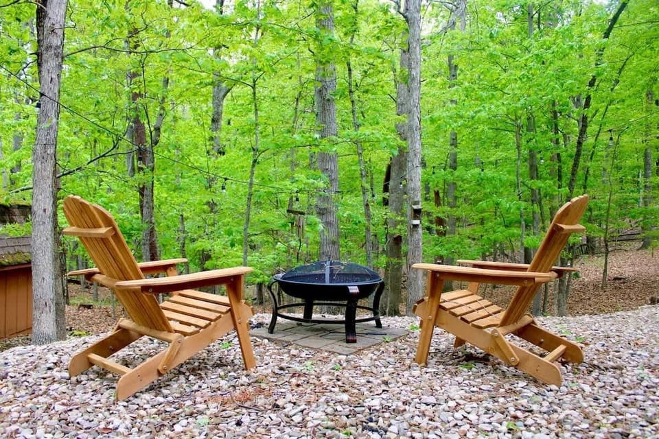 Adirondack chairs located in the back of the house. *note fire pit is no longer there