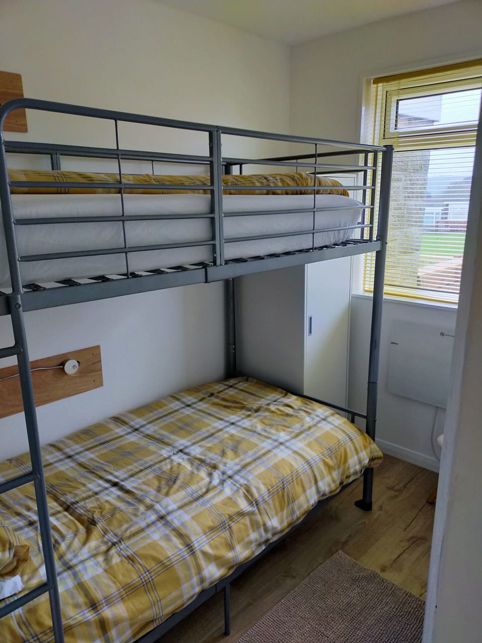 Our second bedroom, with bunks. Matching towels and fleeces are provided.