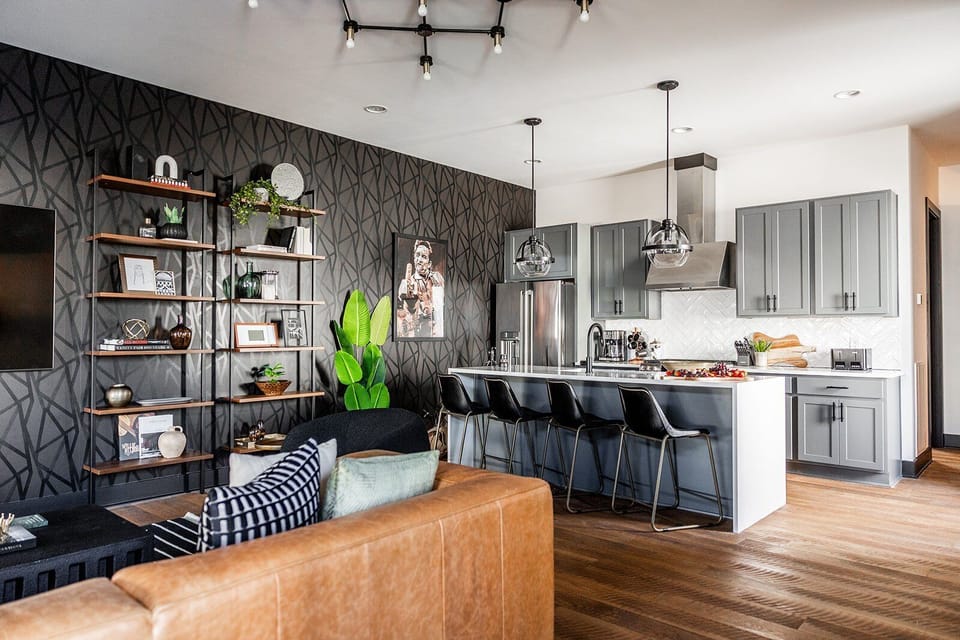 Open concept kitchen leading into living area.