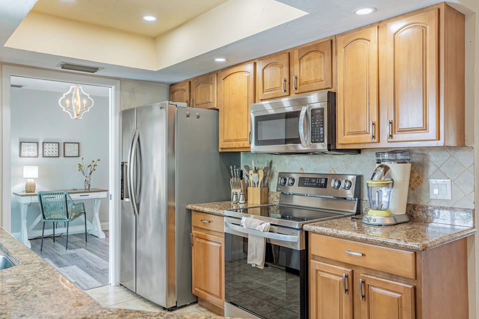 Refrigerator has water and ice dispenser