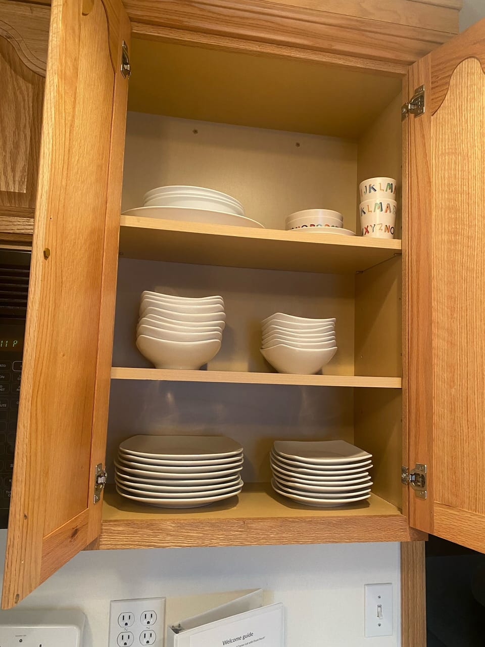 Service for 8.
New dishes.
Children's dishes on top shelf.
