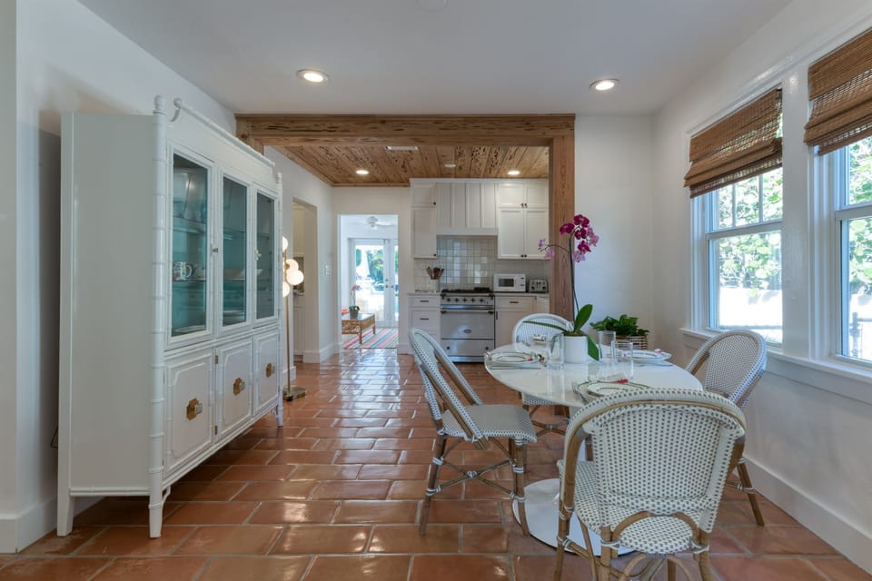 Enjoy the classic designed dining room area of the kitchen with 6 with easy access to the kitchen and living room.