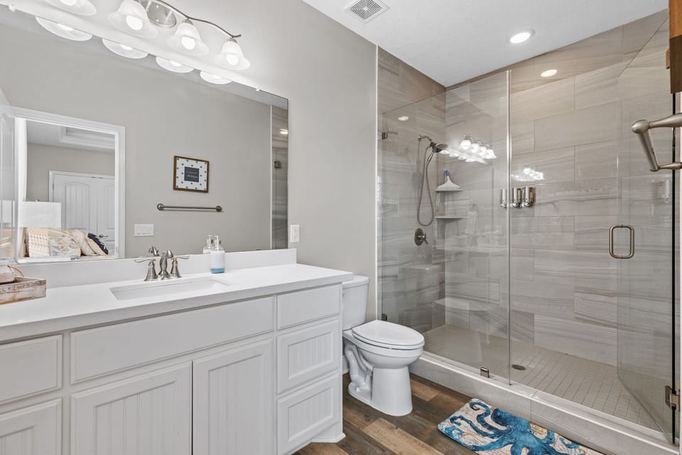 Master bathroom with luxurious walk-in shower.