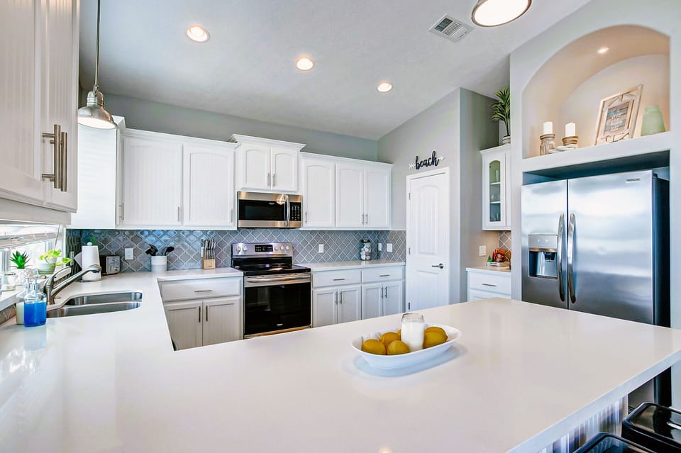 Enjoy a clean, modern, fully stocked kitchen.