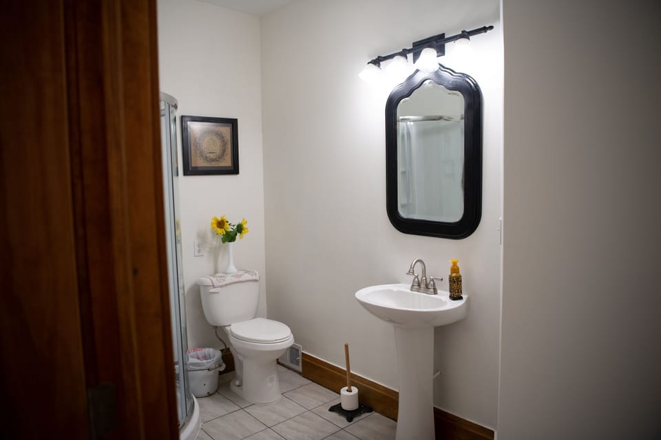 Private bath located just across the hall from the bedroom. 