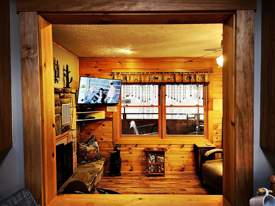 Cook in the kitchen while watching TV or the trees swaying outside 