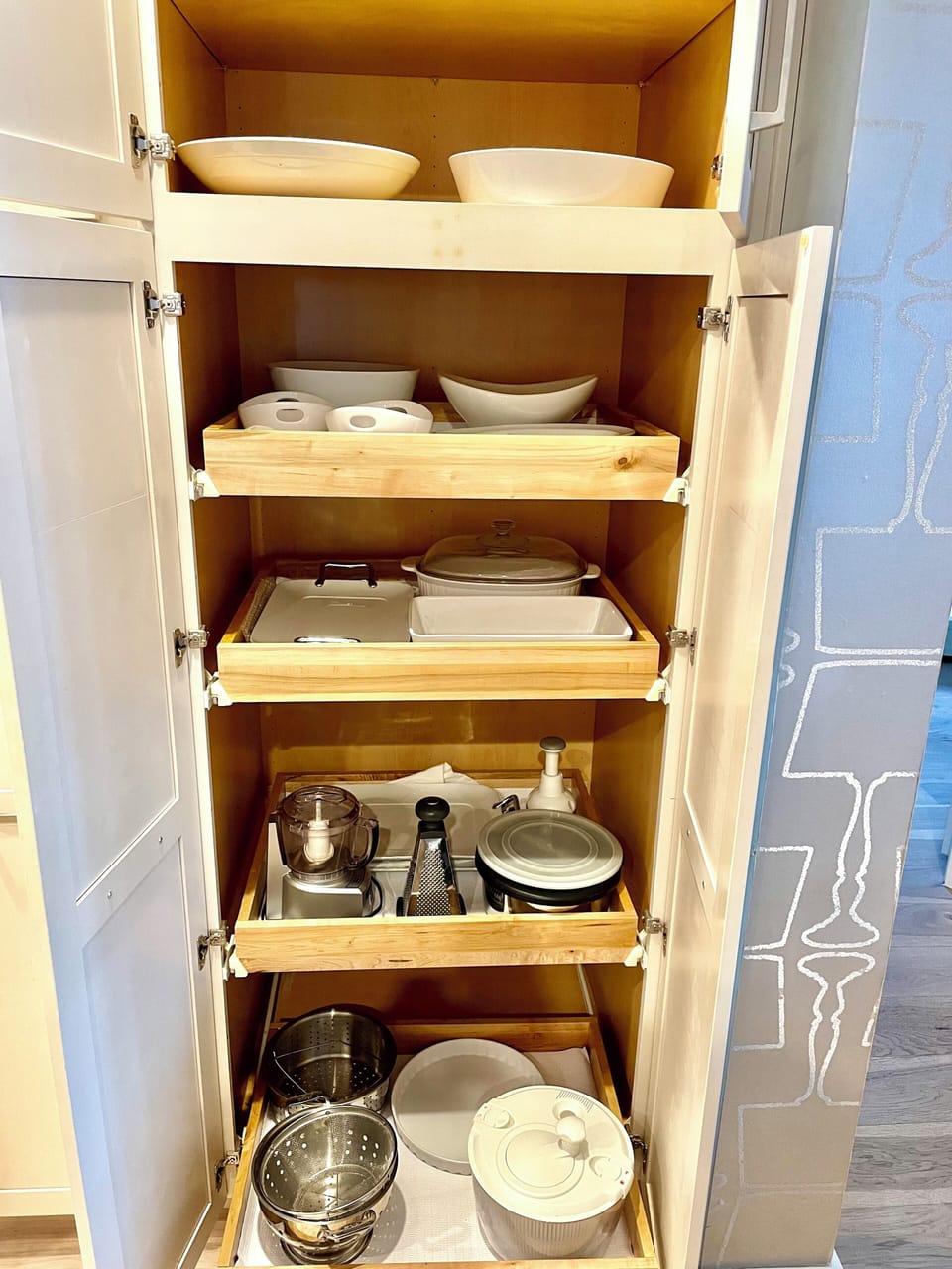 Crate and Barrel, AllClad and LeCrueset cookware, crystal barware