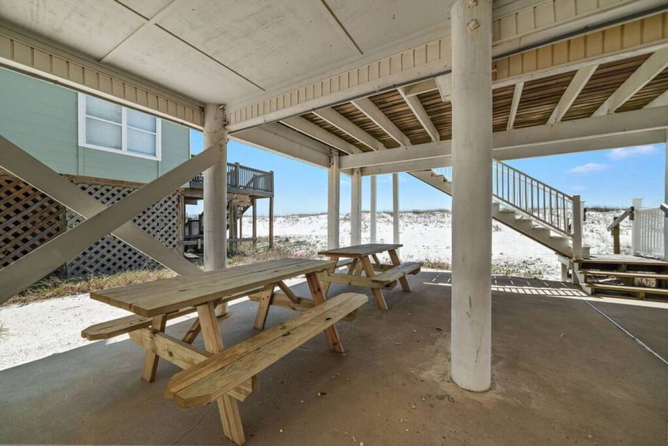 2 picnic tables where you can relax, cool off, and have some meals.