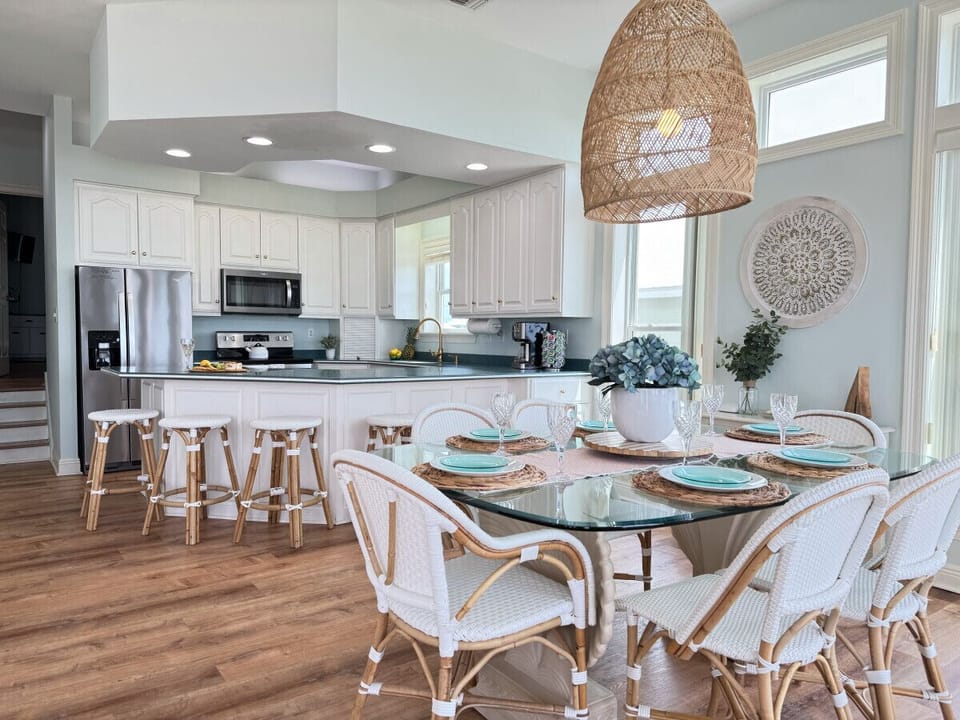 Plenty of seating with the kitchen table and bar.