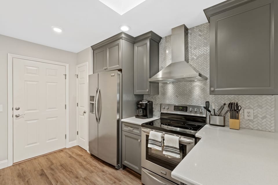 Modern, fully-equipped kitchen with stainless steel appliances