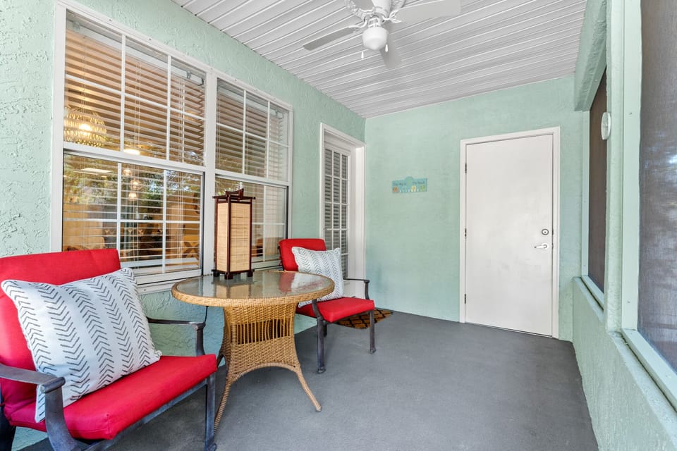 Sunroom & patio overlooking a spacious, tree-filled backyard & sounds of nature