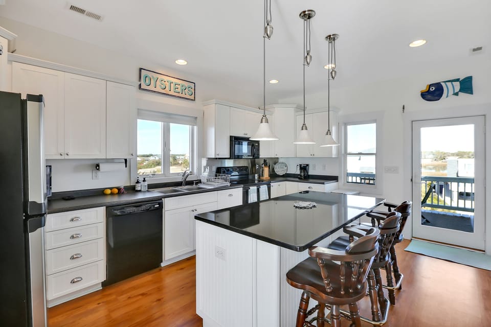 Fully furnished kitchen, including pots, dishes, silverware, etc.