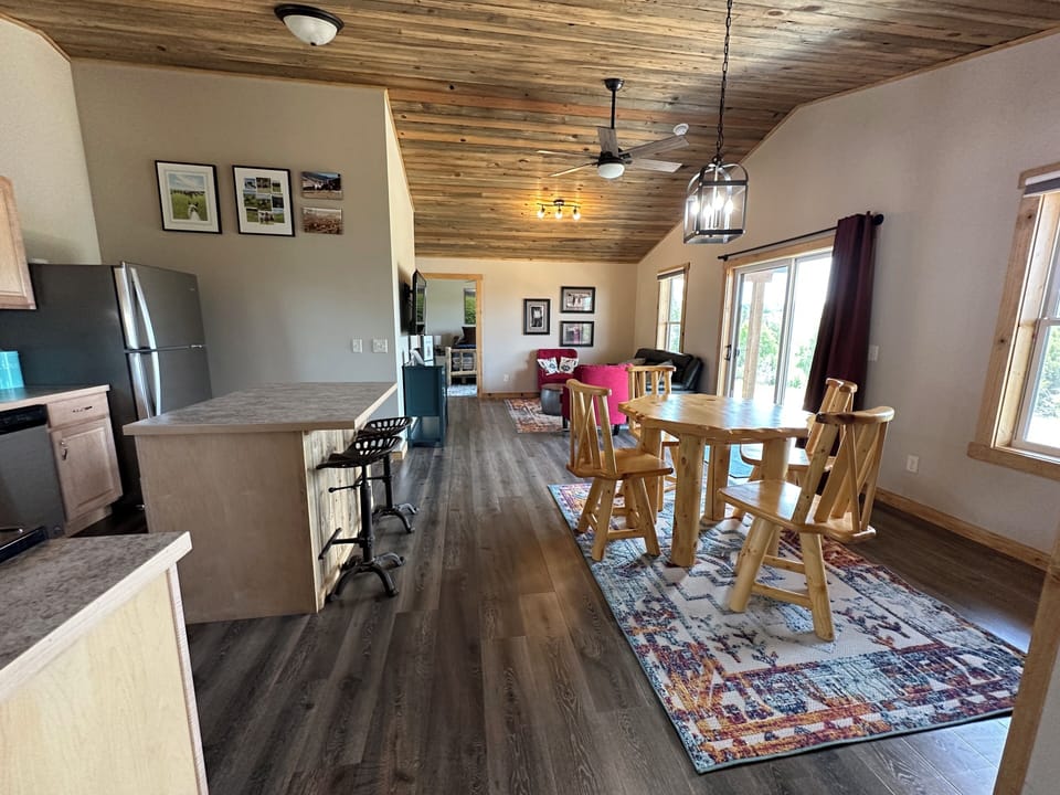 View from Master bedroom to kitchen, dining room and living room.