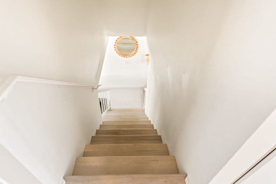 Staircase leading to upstairs. 