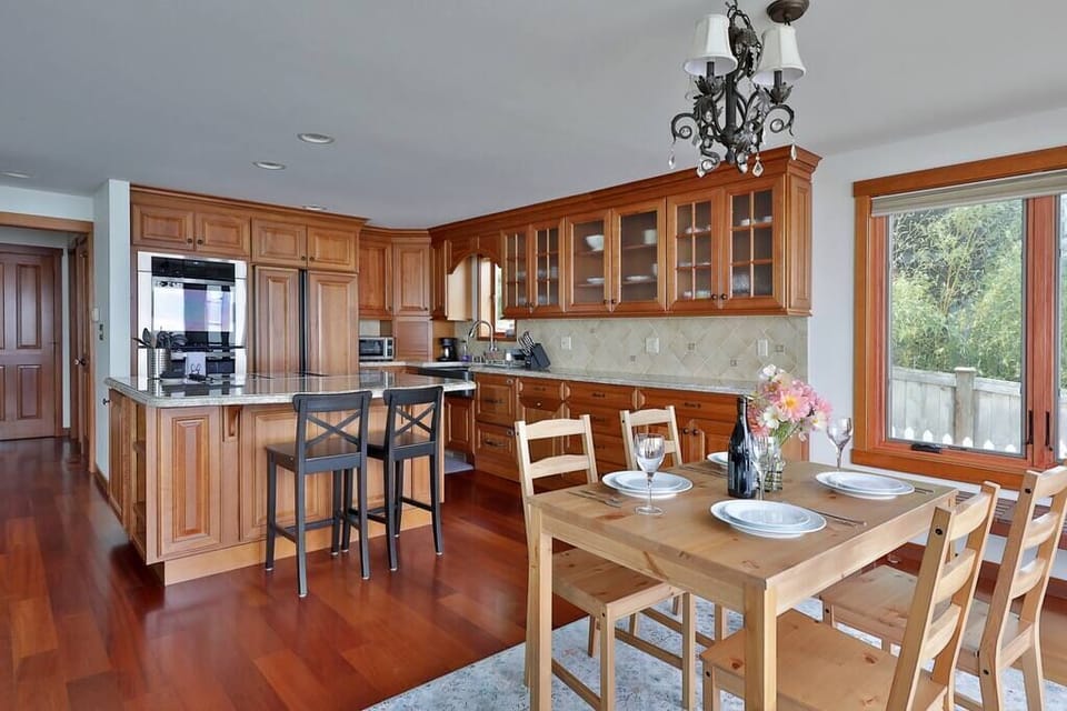 The kitchen has two ovens, built in fridge and dishwasher. Dining table seats 4 comfortably