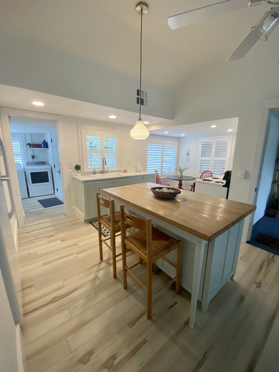Kitchen area with open concept…to right is door to car port/screened porch 