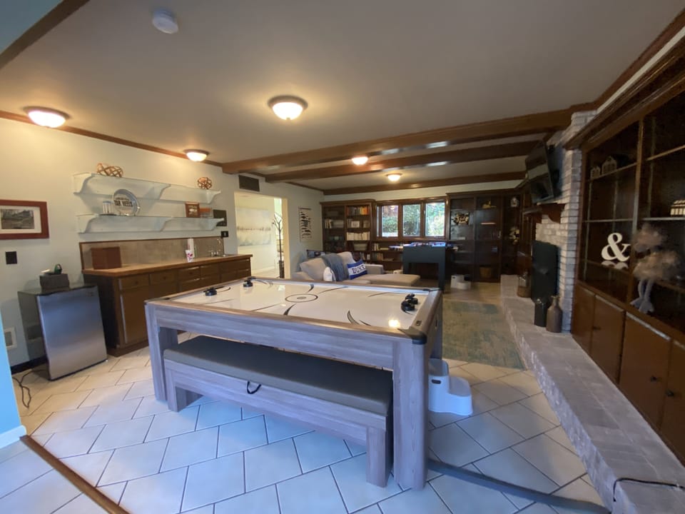 Downstairs living room- Air hockey table