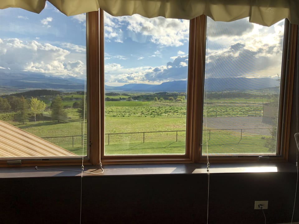 Tremendous upper-level master bedroom view of the beautiful valley and sunsets. 