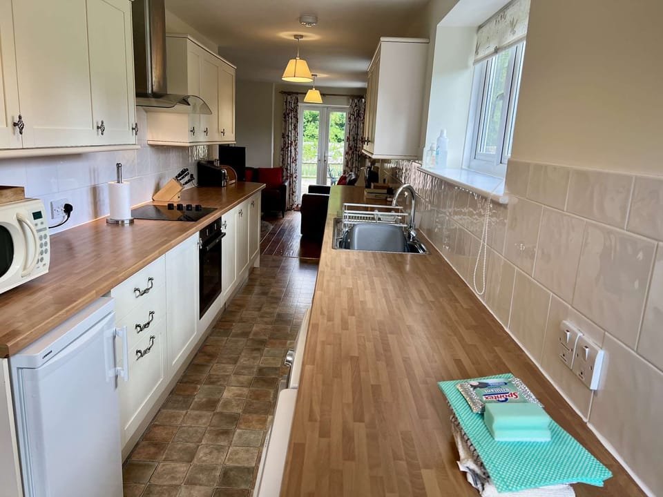 Kitchen with microwave fridge and freezer