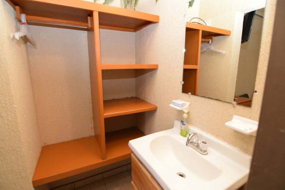 The private full bathroom features a shower and is stocked with fresh towels for your stay