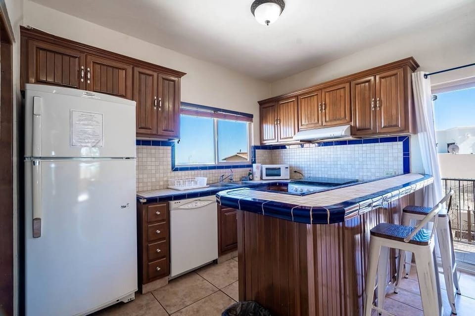 Store all your fresh groceries and leftovers in the spacious fridge at La Hacienda in San Felipe — a fully equipped kitchen makes self-catering easy.