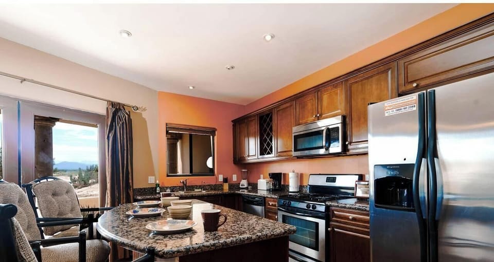 Save money on restaurants. This full kitchen at Casa Campbell vacation rental inside El Dorado Ranch in San Felipe comes with stove, fridge, microwave, and counter space.