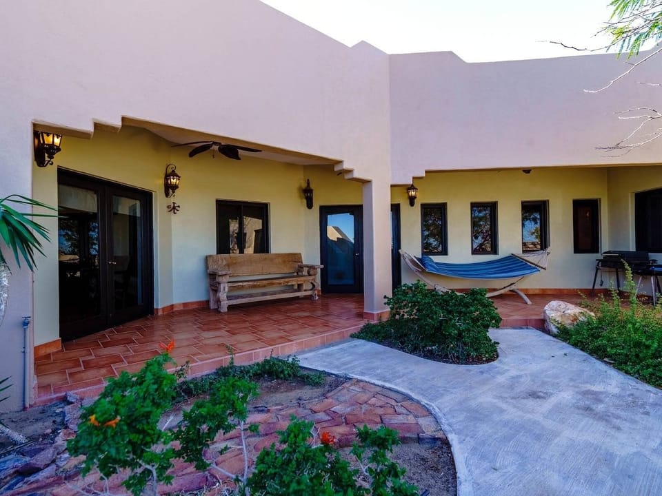 Enjoy the Baja weather on the outdoor benches — perfect for morning coffee or sunset drinks on the patio .