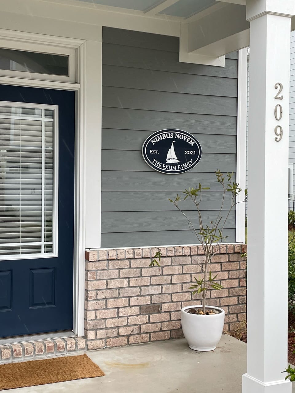 House front door sign for Nimbus Novem
