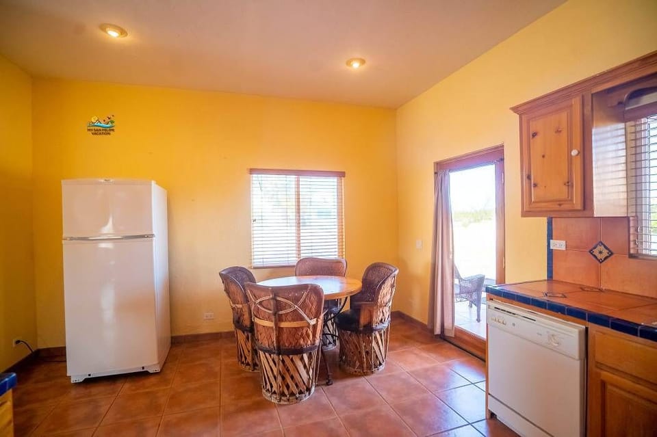 Gather around the dining table at Casa Melissa in Playa de Oro San Felipe Baja California MX — perfect for family dinners.