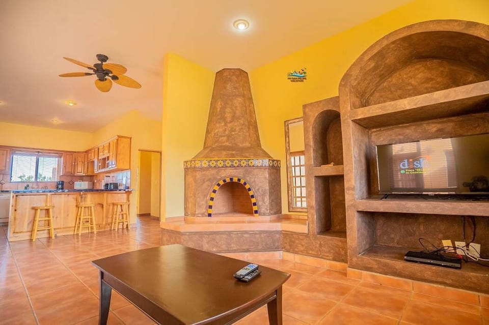 Cozy up by the traditional wood-burning fireplace at Casa Melissa in Playa de Oro San Felipe BC Mexico — perfect for cool Baja evenings.
