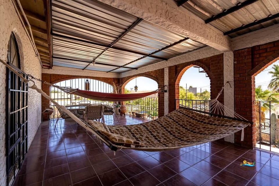 Step onto the upstairs patio at Casa Oasis in downtown San Felipe — fresh air and city views.