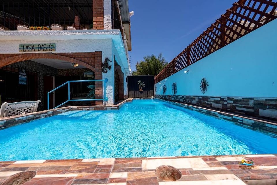 See the swimming pool from the front of Casa Oasis in downtown San Felipe BC Mexico — cool water ready for you.
