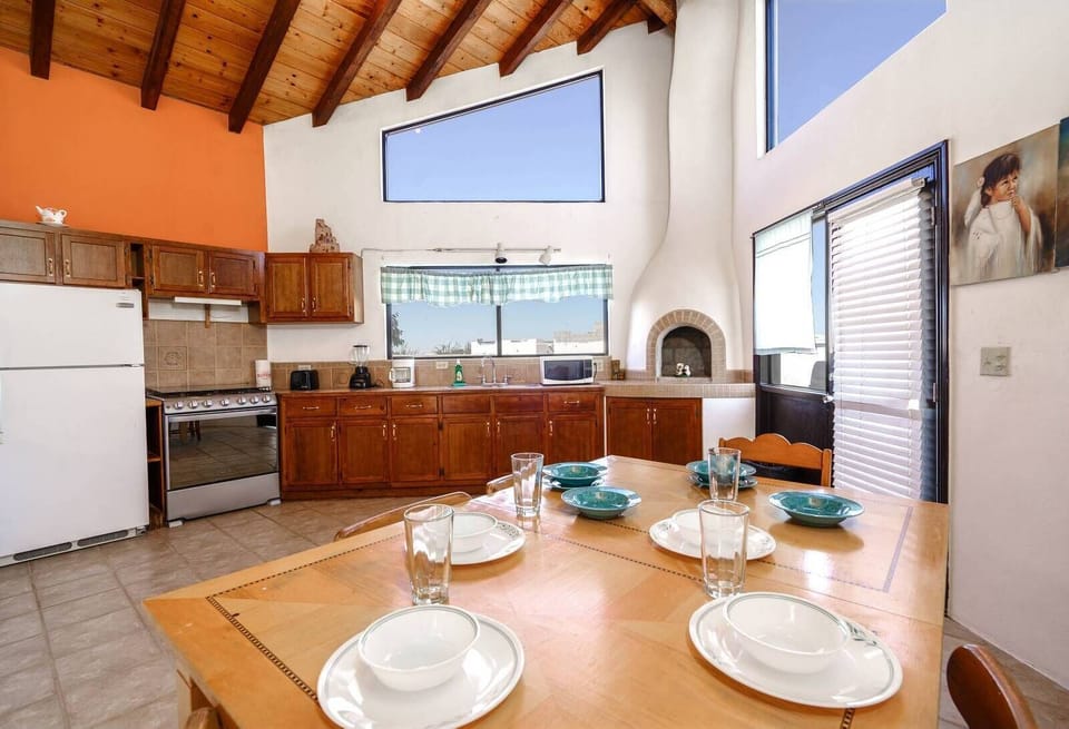 Enjoy meals around the dining table at Casa Palos Verdes in El Dorado Ranch San Felipe — seating for the whole group.