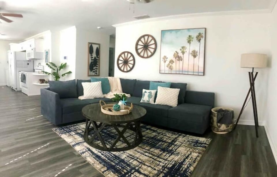 Living area, modular couch can be moved into bed 