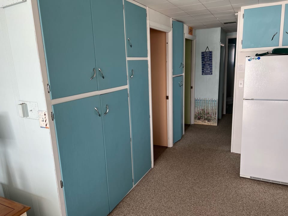 Storage, towels, and extra bed linens.