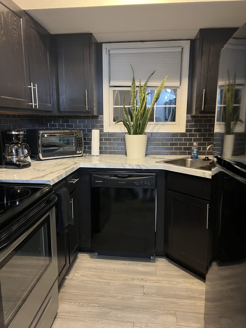 Kitchen...View 1- small but functional and appealing.